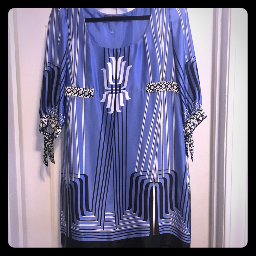 Flowy silk patterned dress.